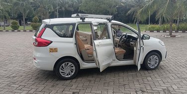 tempo traveller kerala price